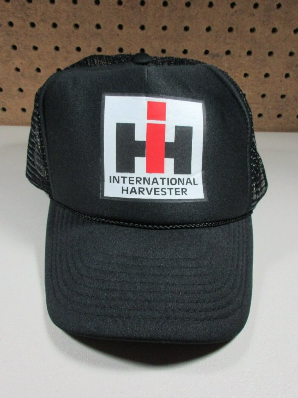 Nissin mens black Harvester International trucker snapback hat NWOT
